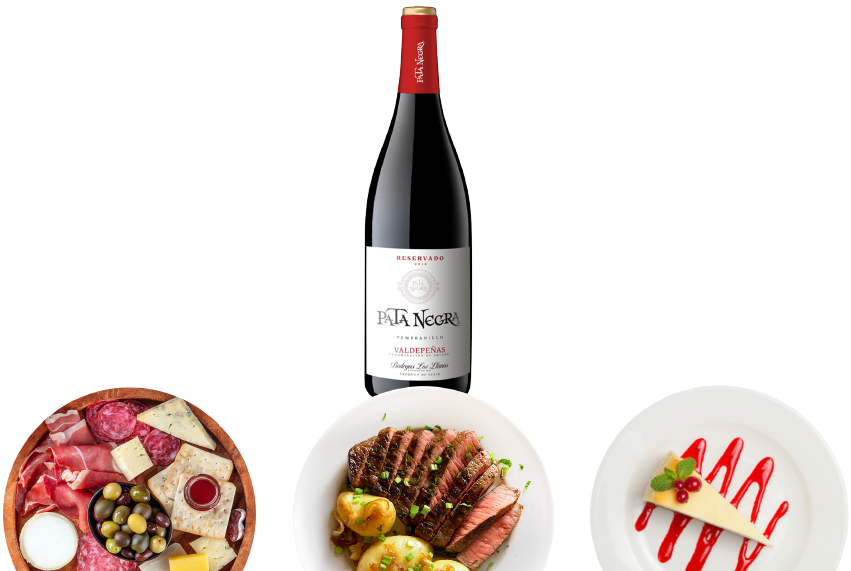 A bottle of wine and food.